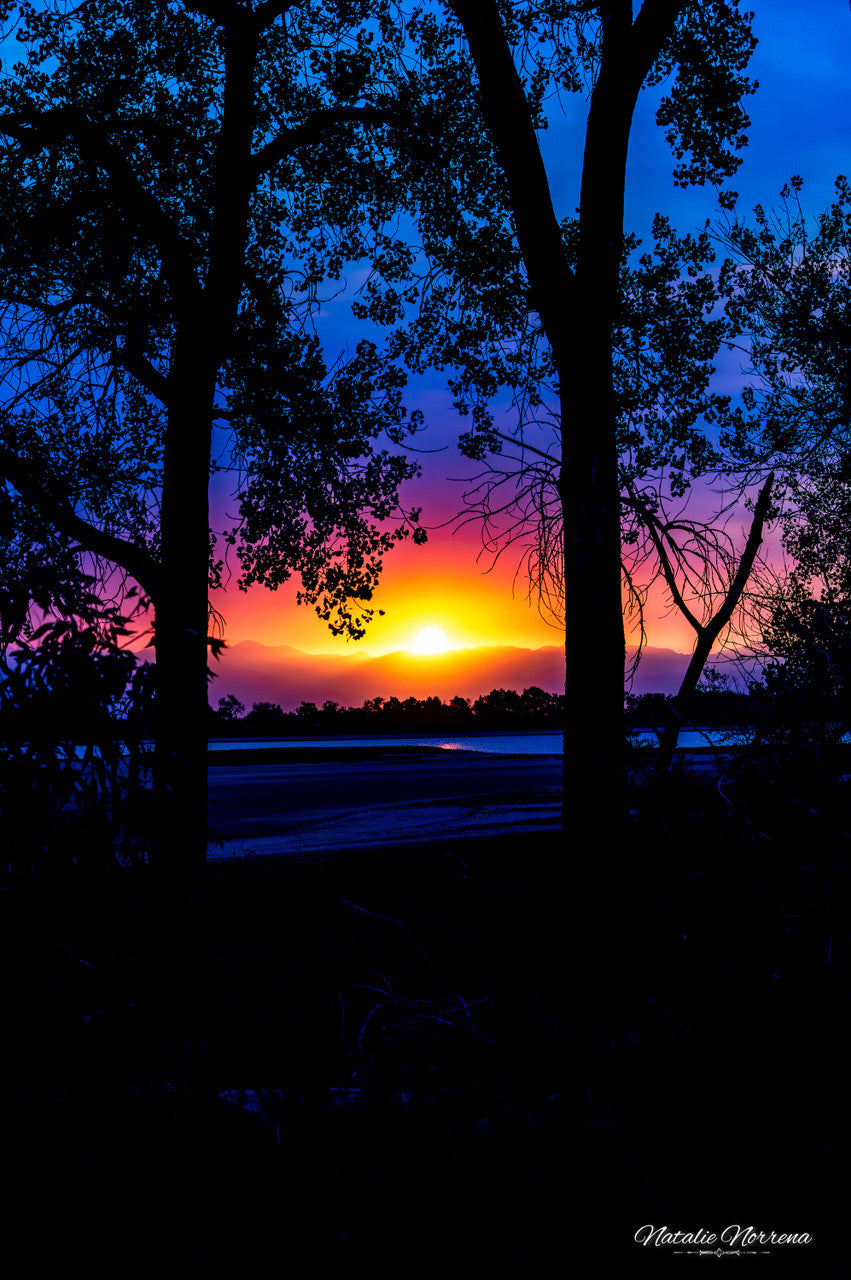 Smoky Sunset Over the Rockies: A Vivid Giclee Print image 1